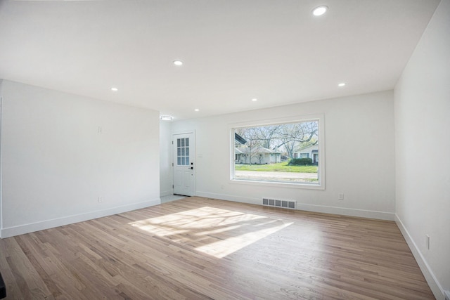 38501 Winkler St, Harrison Township, MI 48045 - unfurnished room with light wood finished floors, recessed lighting, and baseboards
