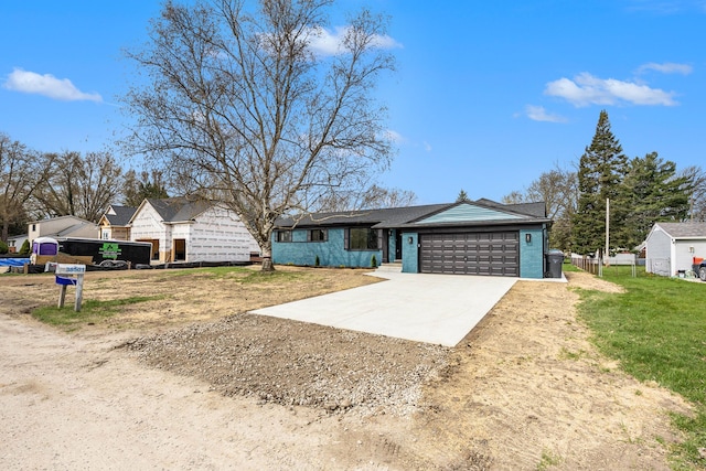 38501 Winkler St, Harrison Township, MI 48045 - view of front of property with an attached garage and concrete driveway