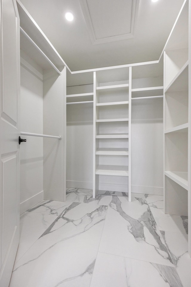 38501 Winkler St, Harrison Township, MI 48045 - walk in closet featuring light marble finish flooring and attic access