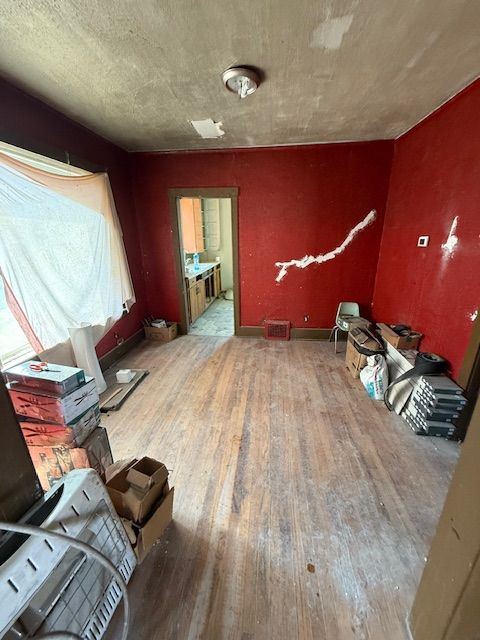 15779 Alden St, Detroit, MI 48238 - unfurnished living room with wood-type flooring