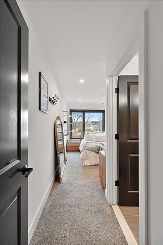 3313 Cochrane St, Detroit, MI 48208 - corridor featuring light carpet, baseboards, and recessed lighting