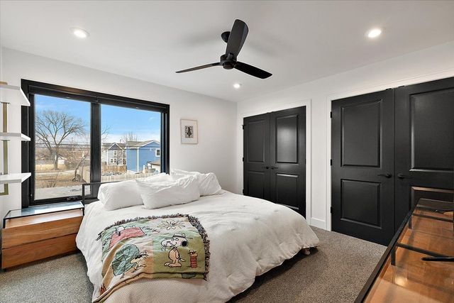 3313 Cochrane St, Detroit, MI 48208 - bedroom featuring carpet flooring, two closets, recessed lighting, and a ceiling fan