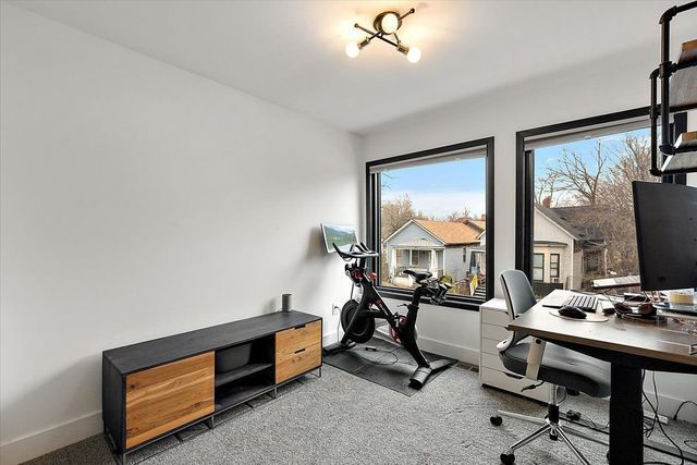 3313 Cochrane St, Detroit, MI 48208 - home office with carpet flooring and baseboards