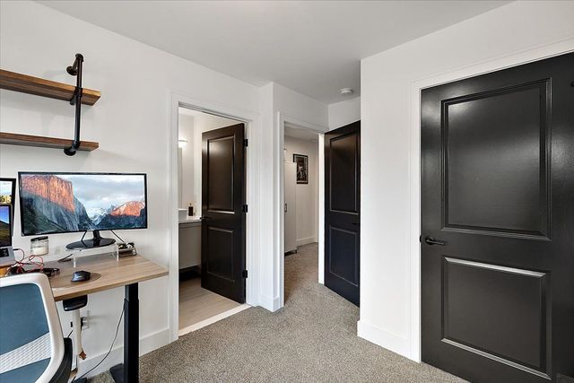 3313 Cochrane St, Detroit, MI 48208 - home office featuring light carpet and baseboards