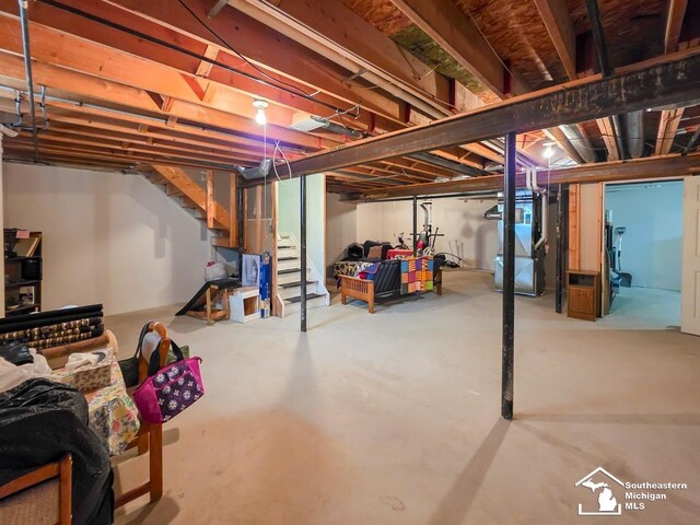 17795 Bobwhite Ct, Brownstown, MI 48192 - unfinished below grade area featuring stairway