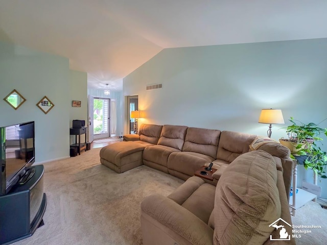 17795 Bobwhite Ct, Brownstown, MI 48192 - carpeted living room featuring vaulted ceiling