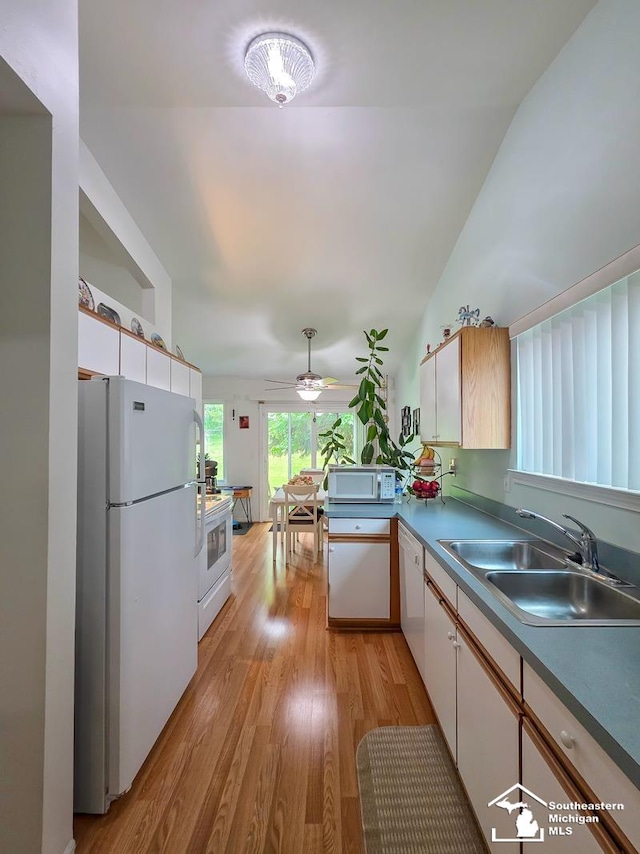 17795 Bobwhite Ct, Brownstown, MI 48192 - kitchen with white appliances, a sink, light wood finished floors, ceiling fan, and white cabinetry