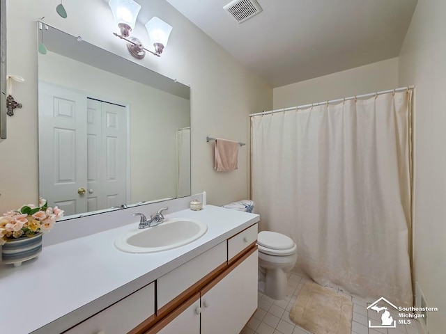 17795 Bobwhite Ct, Brownstown, MI 48192 - full bath with tile patterned floors, vanity, and toilet