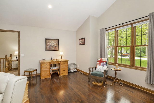 office space featuring vaulted ceiling, dark wood-style floors, and baseboards