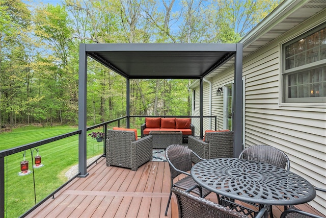 wooden deck featuring outdoor lounge area and a lawn
