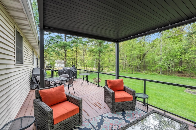 wooden deck with a yard