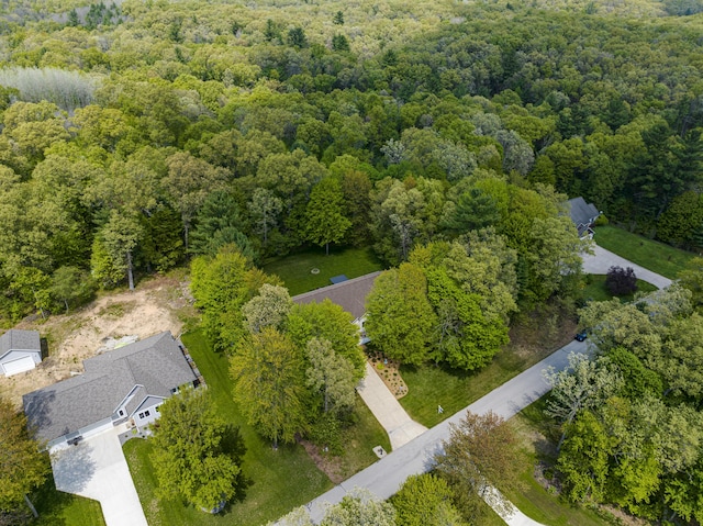 drone / aerial view of a heavily wooded area