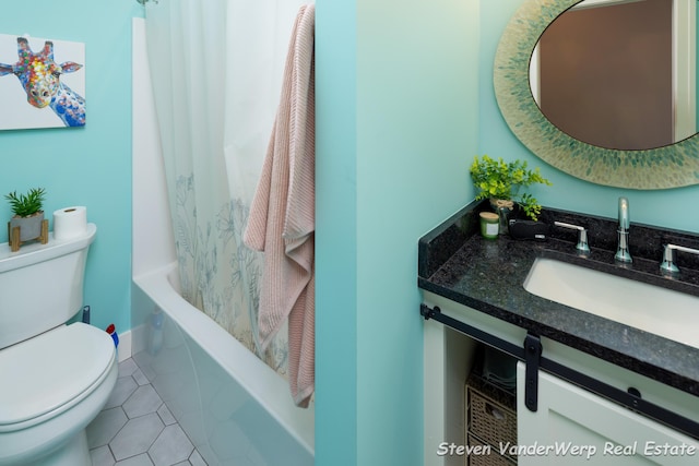 12640 Bucs Dr, Grand Haven, MI 49417 - bathroom with toilet, tile patterned flooring, vanity, and shower / bathtub combination with curtain