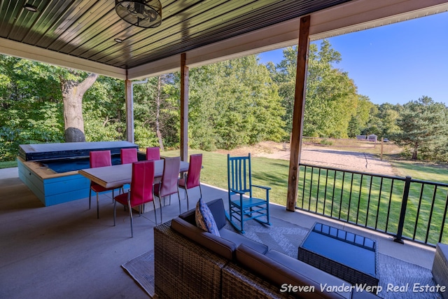 12640 Bucs Dr, Grand Haven, MI 49417 - view of patio / terrace with outdoor dining space and an outdoor living space
