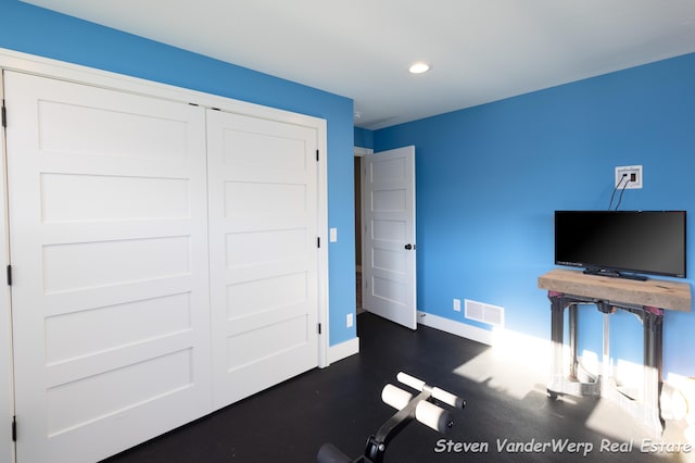 12640 Bucs Dr, Grand Haven, MI 49417 - exercise area featuring baseboards and recessed lighting