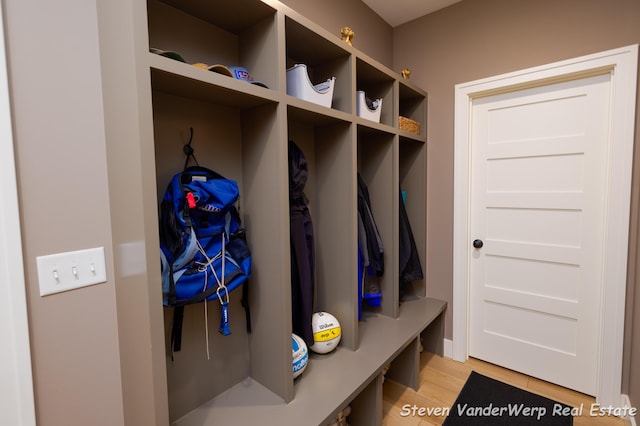12640 Bucs Dr, Grand Haven, MI 49417 - mudroom featuring light wood-style floors