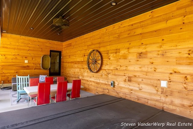 12640 Bucs Dr, Grand Haven, MI 49417 - dining space with wood walls and wooden ceiling