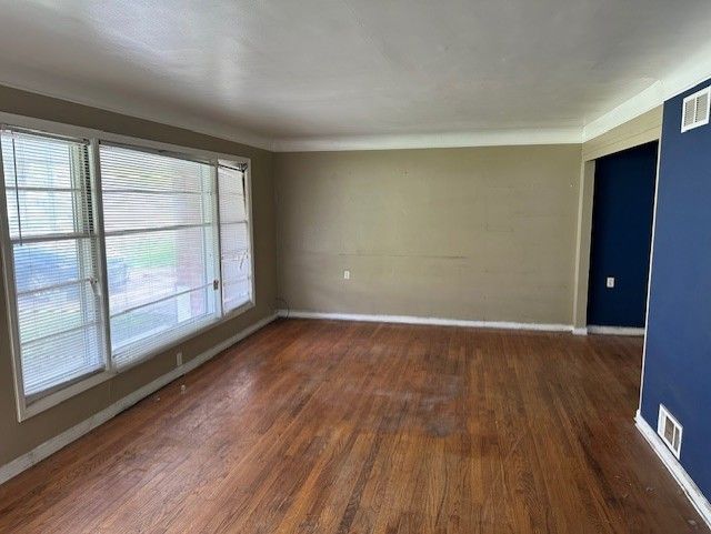 21383 Mada Ave, Southfield, MI 48075 - empty room featuring wood finished floors and baseboards