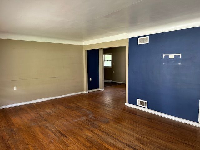 21383 Mada Ave, Southfield, MI 48075 - unfurnished room featuring baseboards and wood finished floors