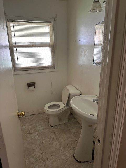 21383 Mada Ave, Southfield, MI 48075 - bathroom with toilet and tile patterned flooring
