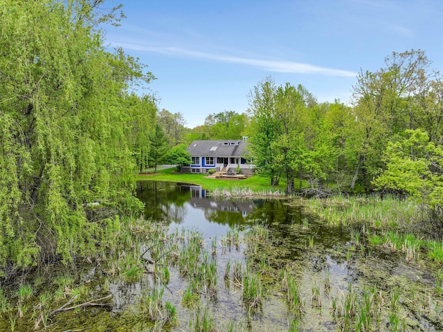 1355 W Buell Rd, Oakland, MI 48363 - water view with a heavily wooded area