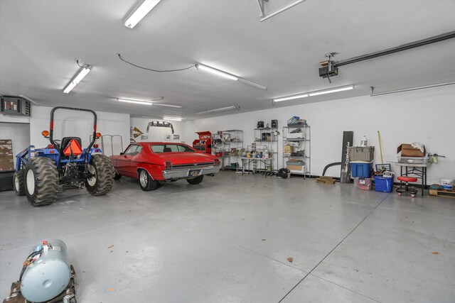 1355 W Buell Rd, Oakland, MI 48363 - garage with a garage door opener