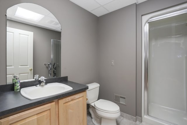 1355 W Buell Rd, Oakland, MI 48363 - full bath featuring a paneled ceiling, a shower stall, tile patterned floors, toilet, and vanity