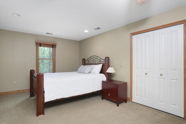 1355 W Buell Rd, Oakland, MI 48363 - bedroom featuring light colored carpet, a closet, baseboards, and recessed lighting