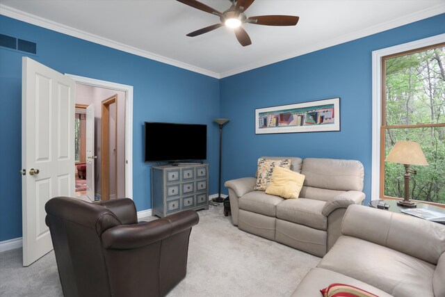 1355 W Buell Rd, Oakland, MI 48363 - living area with carpet floors, ceiling fan, baseboards, and crown molding