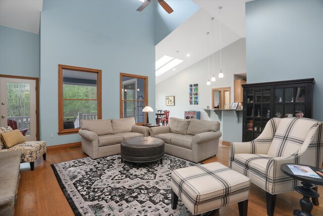 1355 W Buell Rd, Oakland, MI 48363 - living area with high vaulted ceiling, wood finished floors, and ceiling fan