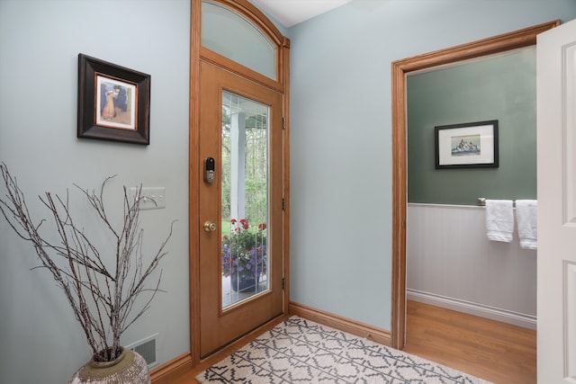1355 W Buell Rd, Oakland, MI 48363 - entryway with light wood-type flooring and baseboards