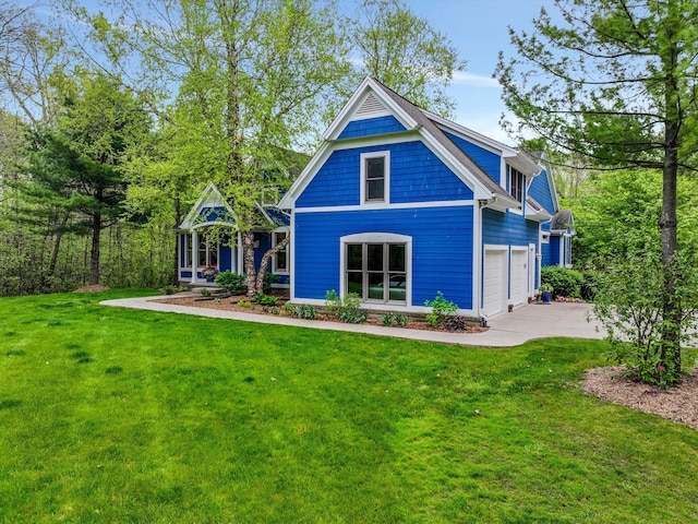 1355 W Buell Rd, Oakland, MI 48363 - rear view of house featuring driveway and a yard