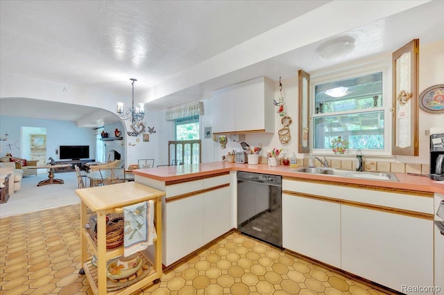 5116 Mohr Valley Ln, Bloomfield Hills, MI 48304 - kitchen featuring dishwasher, a peninsula, white cabinetry, and light countertops