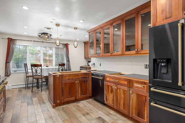 14240 Rosemont Ave, Detroit, MI 48223 - kitchen with black refrigerator with ice dispenser, a baseboard heating unit, brown cabinetry, glass insert cabinets, and recessed lighting
