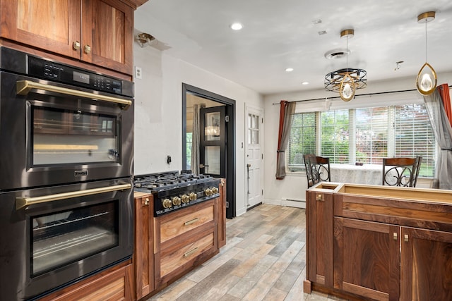 14240 Rosemont Ave, Detroit, MI 48223 - kitchen featuring stainless steel double oven, baseboard heating, black gas stovetop, light wood-style floors, and pendant lighting