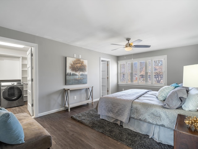 576 E Flint St, Lake Orion, MI 48362 - bedroom featuring washer / dryer, wood finished floors, baseboards, a spacious closet, and ceiling fan