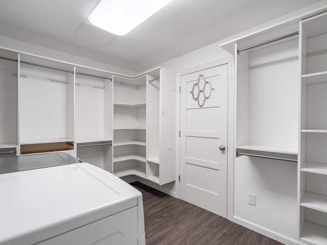 576 E Flint St, Lake Orion, MI 48362 - walk in closet with separate washer and dryer and dark wood-style floors