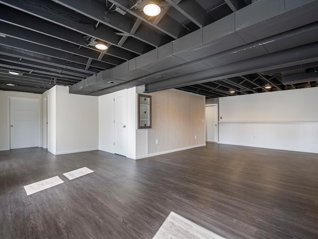 576 E Flint St, Lake Orion, MI 48362 - finished basement featuring dark wood-style floors and baseboards