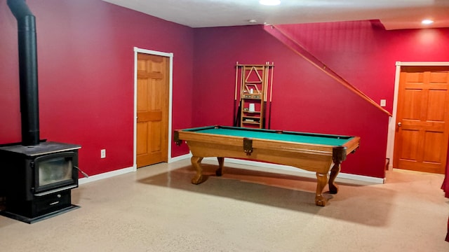 1658 Ridgeview Ct, Ludington, MI 49431 - recreation room featuring a wood stove, recessed lighting, and pool table