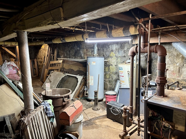 unfinished basement featuring gas water heater