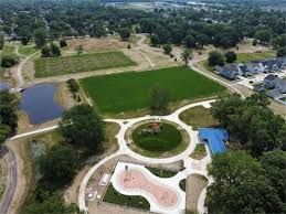 aerial view of property's location featuring a large body of water