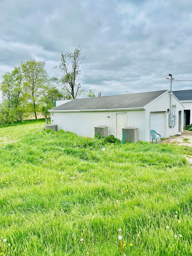 1832 E Carson City Rd, Sheridan, MI 48884 - view of outbuilding with central air condition unit