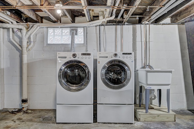 laundry area with washer and clothes dryer