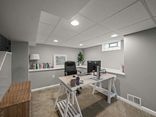 carpeted office space featuring recessed lighting, baseboards, and a paneled ceiling