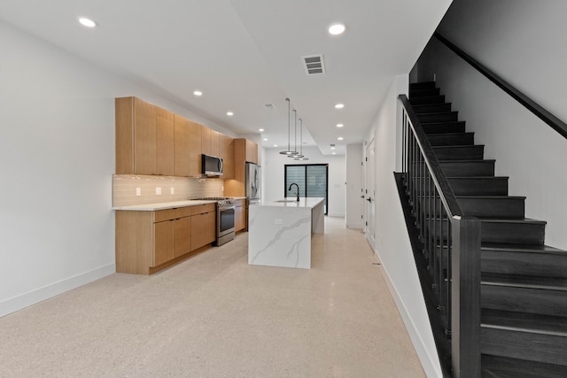 5234 Avery St, Detroit, MI 48208 - kitchen featuring stainless steel appliances, a sink, baseboards, backsplash, and recessed lighting