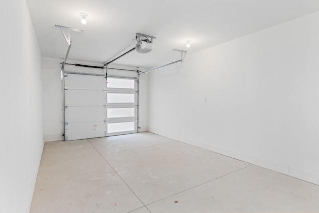 5234 Avery St, Detroit, MI 48208 - garage featuring a garage door opener and baseboards