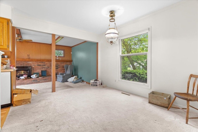 2020 NW Ave, Lansing, MI 48906 - unfurnished room with carpet, crown molding, and wooden walls