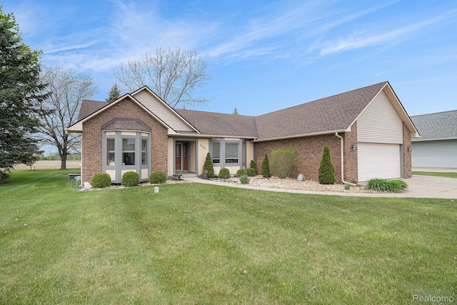 5361 Lin Hill Dr, Swartz Creek, MI 48473 - ranch-style house with brick siding, a garage, roof with shingles, a front yard, and driveway