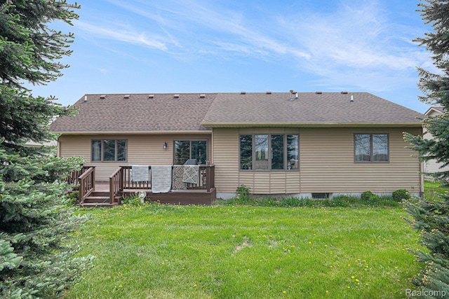 5361 Lin Hill Dr, Swartz Creek, MI 48473 - back of property featuring a lawn, roof with shingles, and a deck