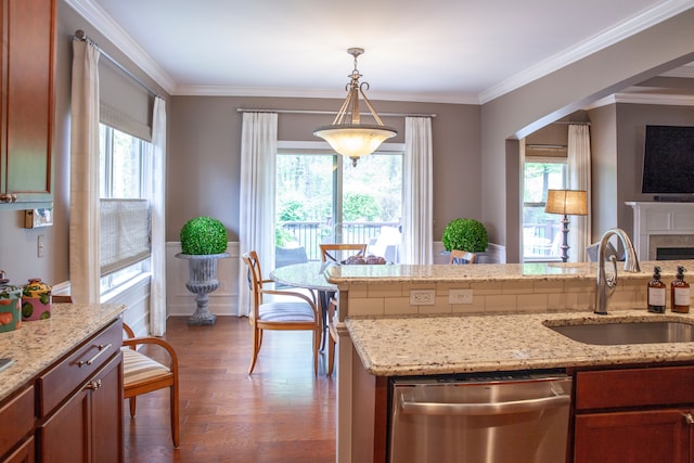 5514 Woodfall Rd, Clarkston, MI 48348 - kitchen featuring stainless steel dishwasher, a sink, wood finished floors, decorative light fixtures, and ornamental molding